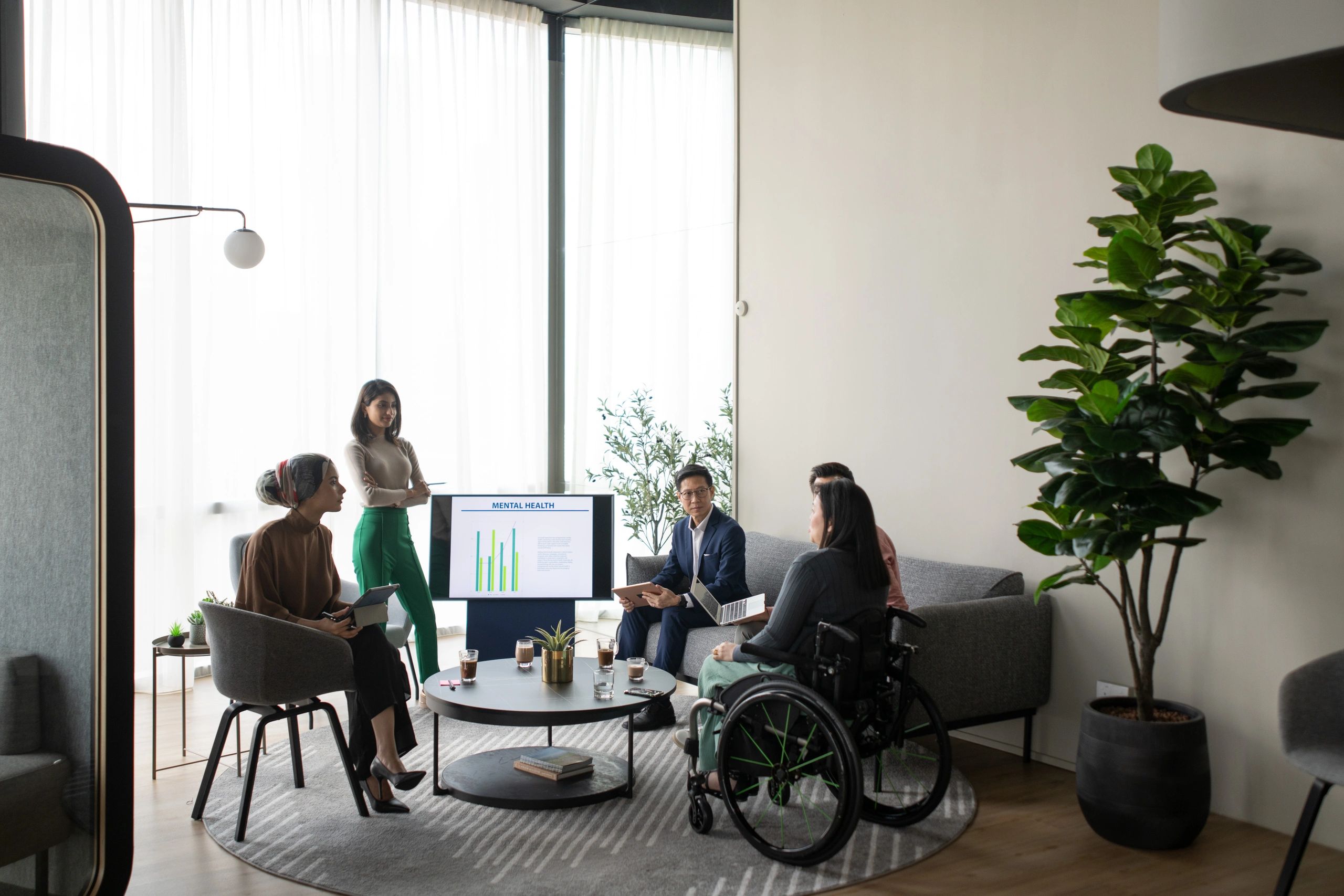Group of professionals in an inclusive workplace discussion
