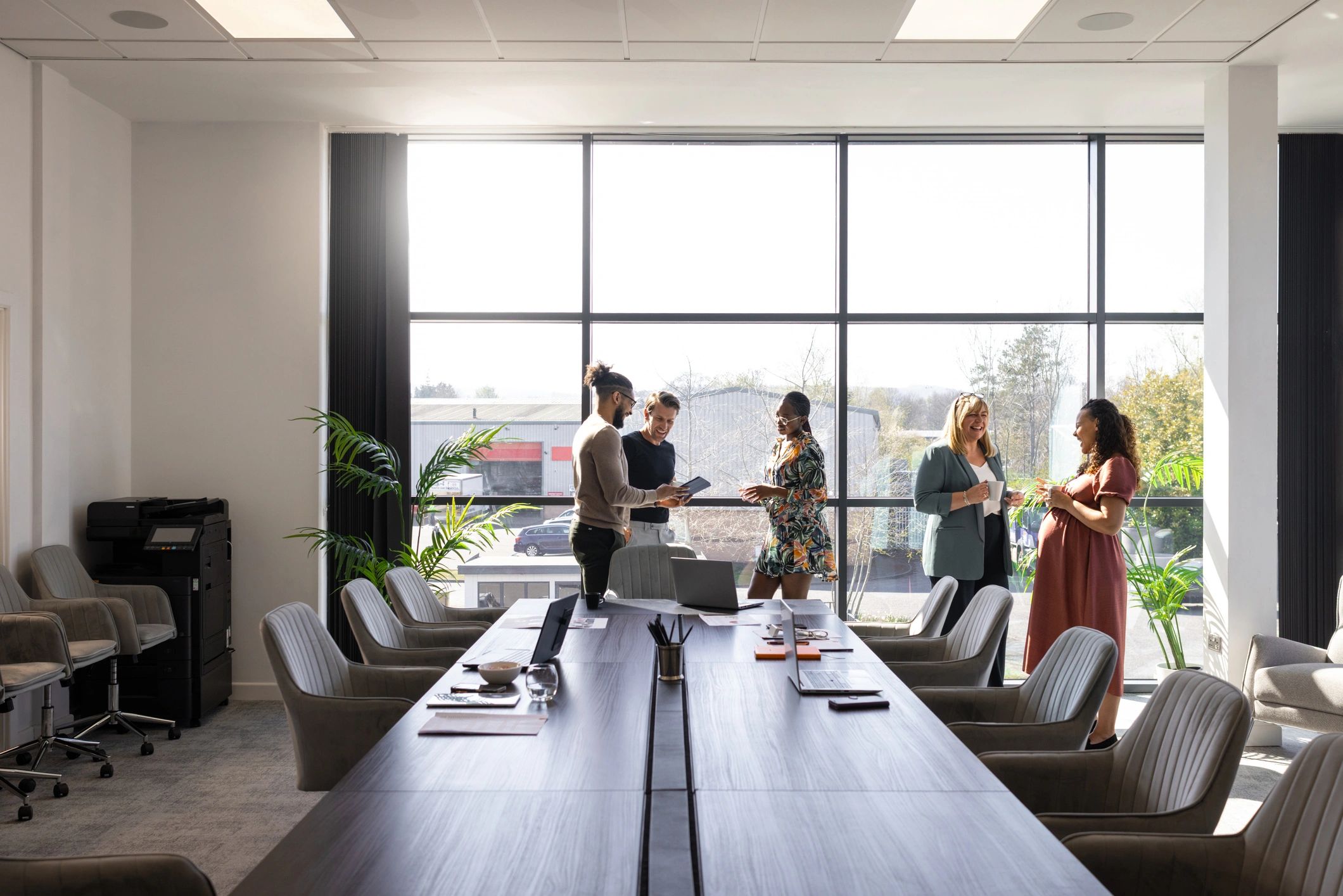 Inclusive workplace team meeting in a bright office